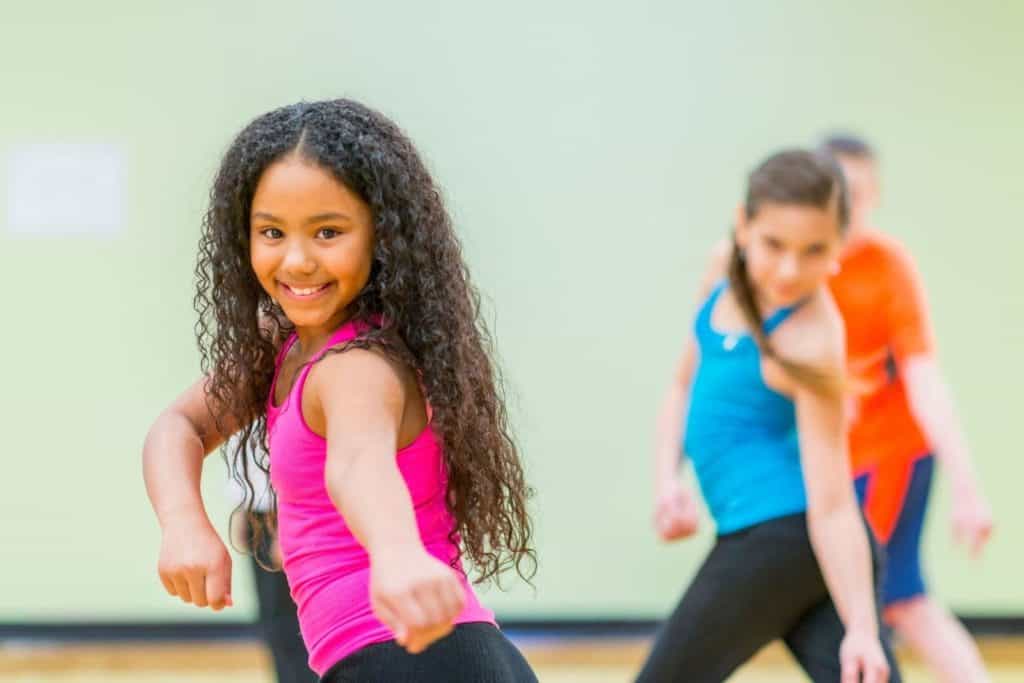 girls and boys in a dance class