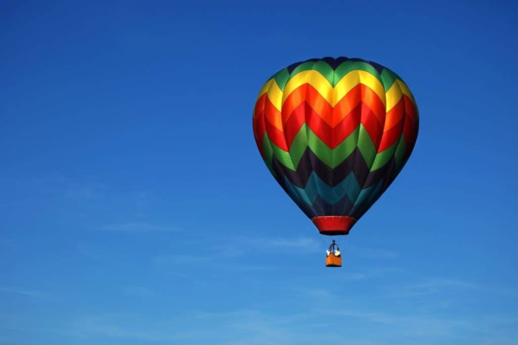 colorful hot air balloon in a bright blue sky