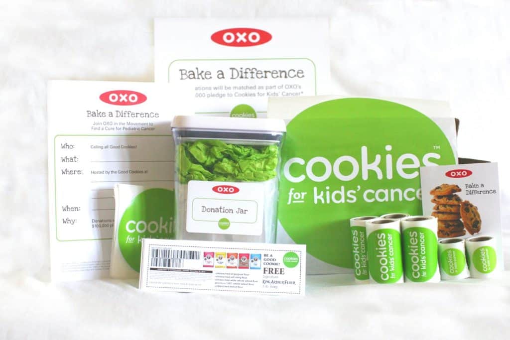 Cookies for Kids' Cancer bake sale kit. OXO Bake a Difference sheets, OXO donation jar, Cookies for Kids' Cancer round green stickers