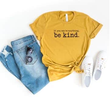 yellow tee that says "If you can be anything, be kind" in black typewriter font.